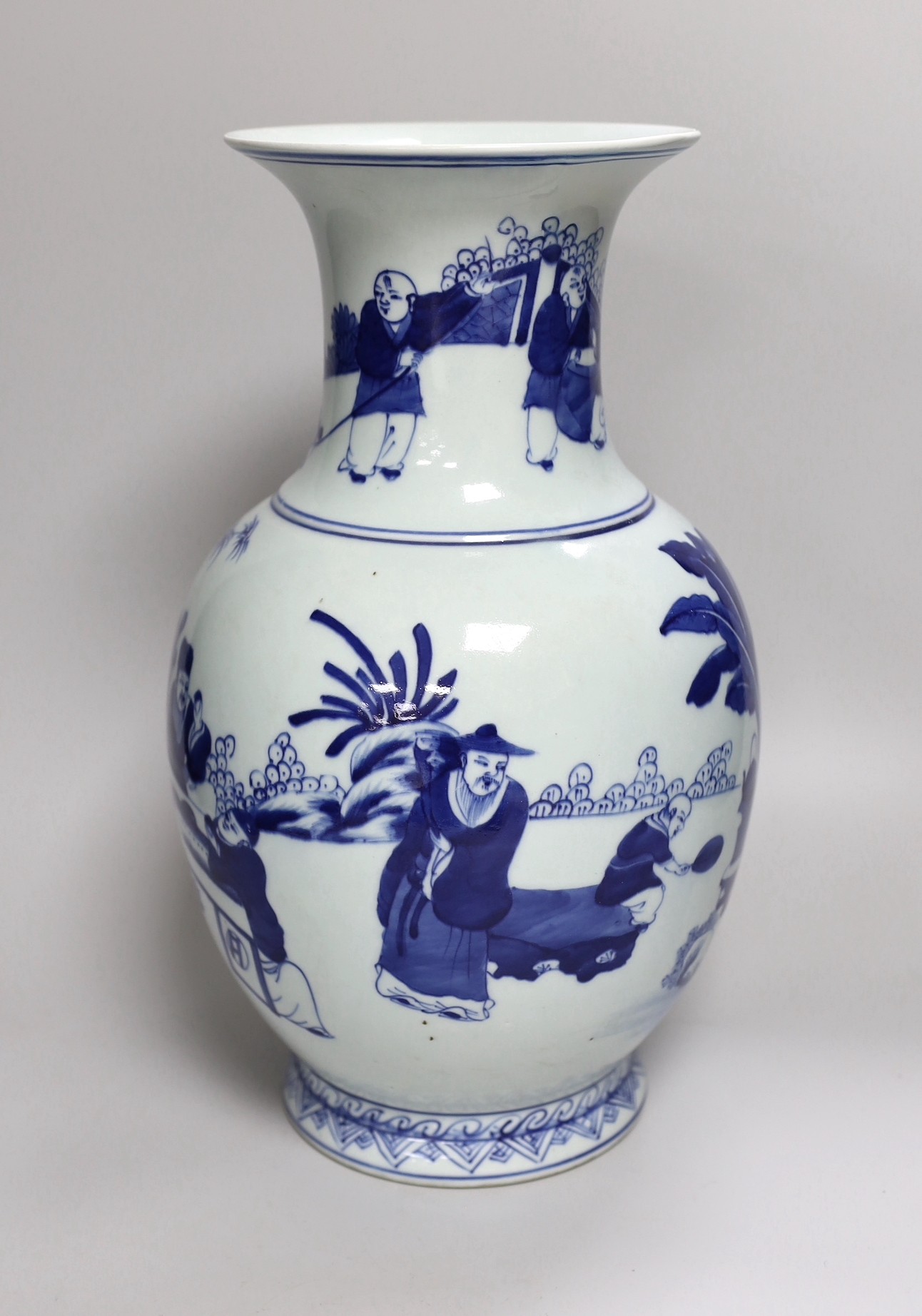 A Chinese blue and white 'scholar's' vase, early 20th century. 37cm high